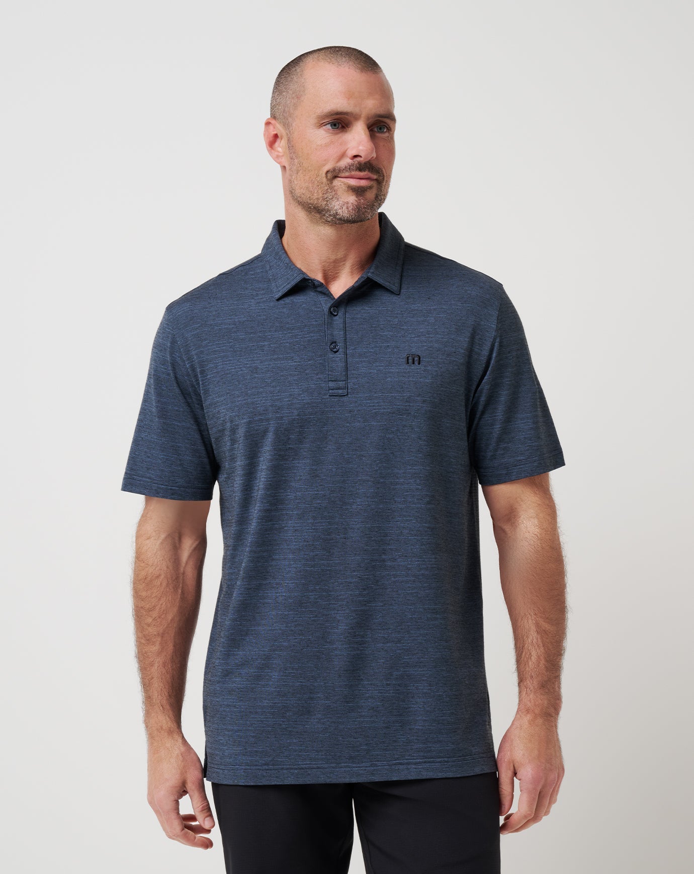 TravisMathew Men's Heater Polo Apparel TravisMathew Vintage Indigo/Black Small